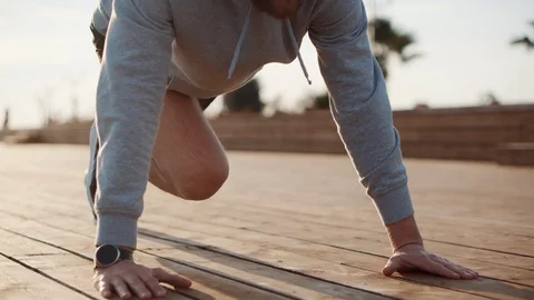 Man taking efforts for running plank exercise Stock Footage 114887191