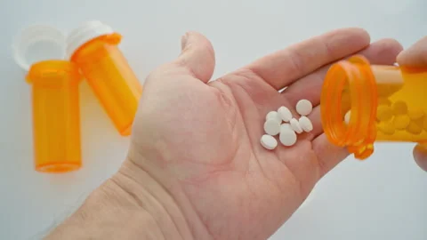 Man Taking Exact Two White Pills Dosage into Palm Close Up Video Stock Footage 320180244