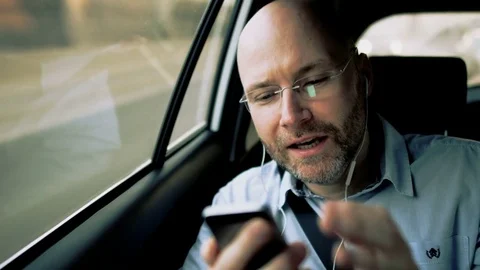 Man Taking Glasses Off and Looking Through a Window Stock Footage 74653328