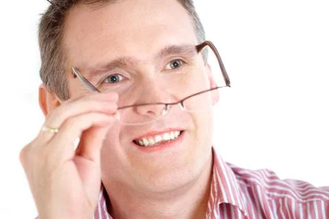 Man taking off glasses Stock Photos