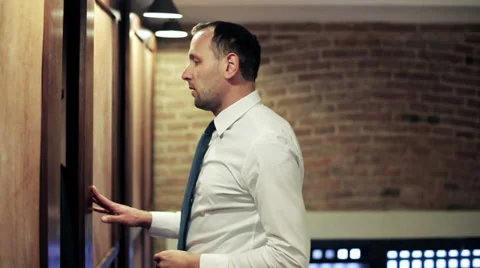 Man taking his jacket out of wardrobe Stock-Footage 37120253