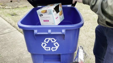 Man taking his recycling items out to the bin. Stock Footage 231516544