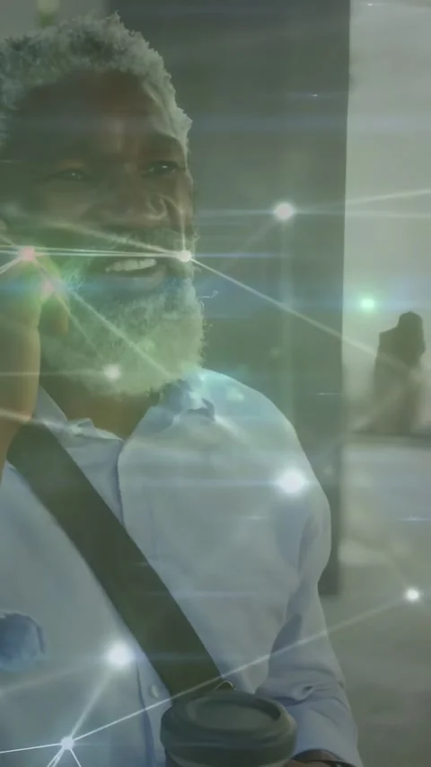 Man taking incoming call for work while holding coffee in lobby, tech overlay Stock Footage 331338226
