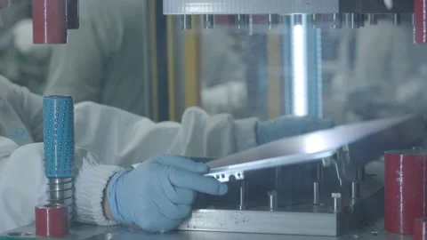 Man taking metal plate from a machine Video stock 150479499