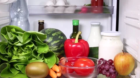 Man taking a milk bottle out of the fridge Stock Footage 135381472