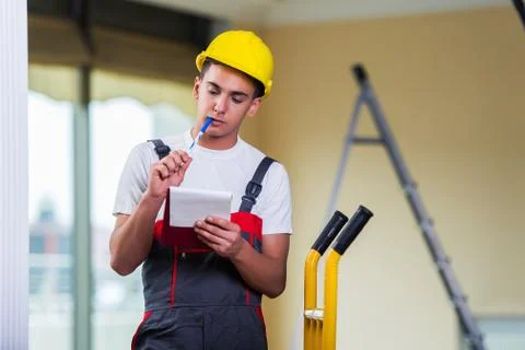 Man taking notes for delivery of boxes Stock Photos