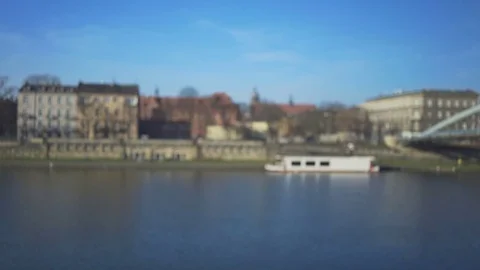 Man taking panoramic photo of the river by tablet computer app, sunny day 動画素材 72710057