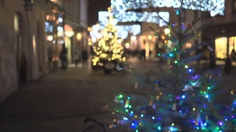 Man taking photo by tablet computer app, at night in city, Christmas, steadycam 库存影片 72782241