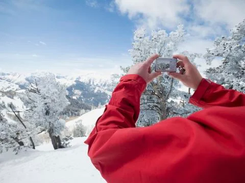 Man taking photograph, Wasatch Mountains, Utah, United States Stock Photos