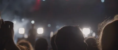 A man taking a picture of band performance during live show concert,slow motion Stock Footage 122011096