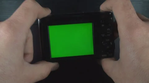 Man Taking Pictures With A Digital Camera Green Screen Stock Footage 36034954