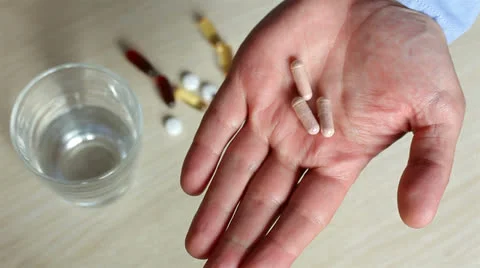 Man taking a pill. 스톡 동영상 25221245