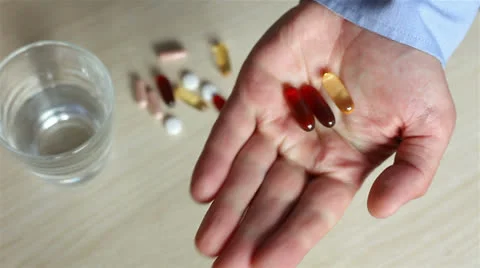 Man taking a pill. Stock Footage 25221275