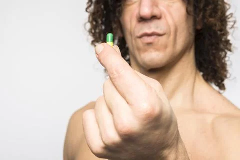 Man taking pill Stock Photos