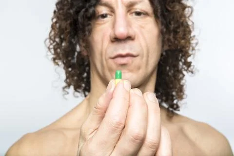 Man taking pill Stock Photos
