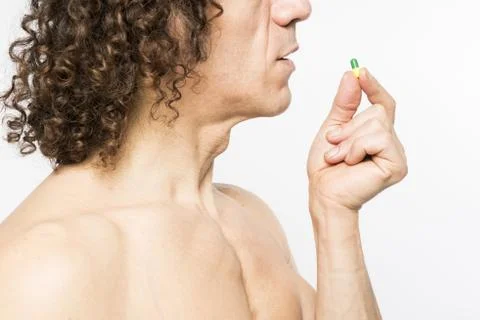 Man taking pill Stock Photos