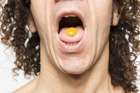 Man taking pill Stock Photos