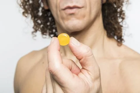 Man taking pill Stock Photos