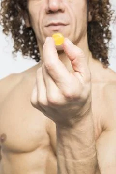 Man taking pill Stock Photos