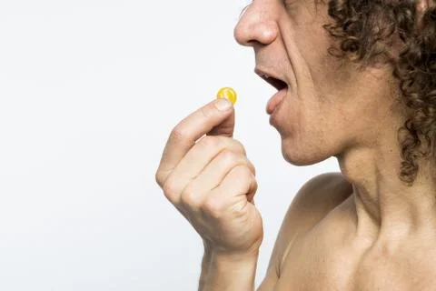 Man taking pill Stock Photos