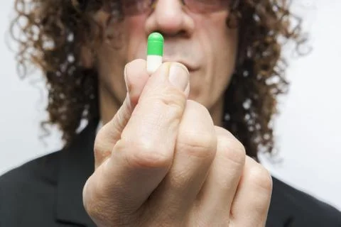 Man taking pill Stock Photos