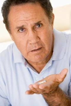 Man Taking Pills Stock Photos