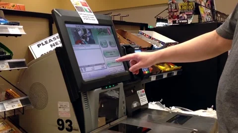 Man taking receipt after paying for food at self checkout counter Stock Footage 54685388