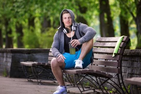 Man taking rest in the park Stock Photos