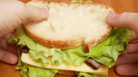Man taking sandwich. Stock Footage 71566510