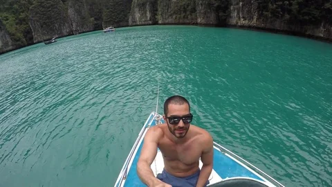 Man taking a selfie on the beach in Thailand Stock Footage 71294891