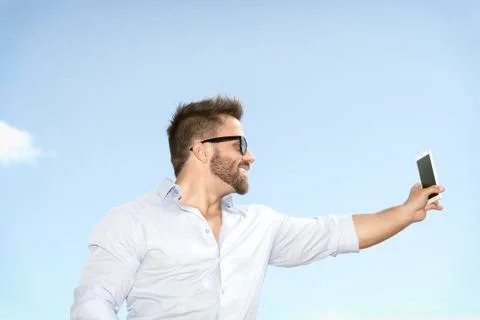 Man taking selfie Stock Photos