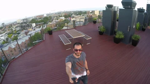 Man taking a selfie with Sydney Skyline on background, Australia Stock Footage 71294907