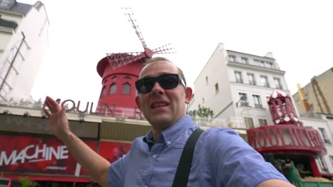 Man taking selfie with a view on Paris in 4k slow motion 60fps Stock Footage 111840746