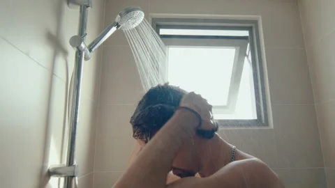 Man Taking a Shower at Home Stock Footage 235657703