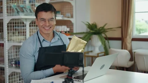 Man taking video working from home small business owner  Stock Footage 160482152
