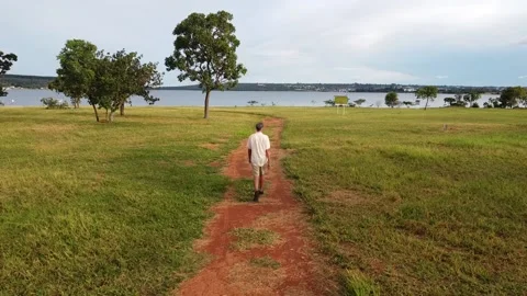 Man taking a walk at Parque das Garcas Stock Footage 169259655