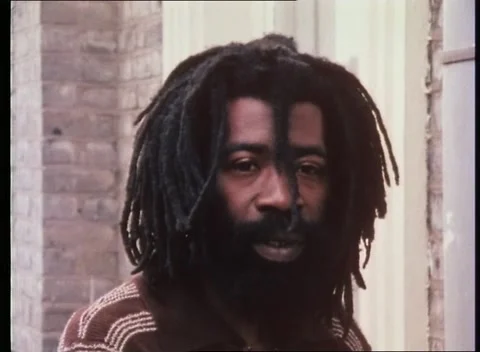 Man talking about different races living in London city together, UK, 1980 Stock Footage 159442464