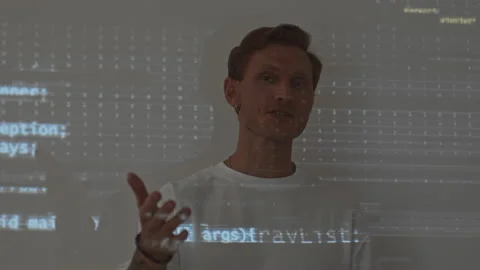 Man Talking about Program Coding at Camera Stock Footage 171539815