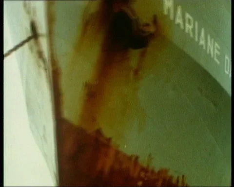 Man talking about water pollution of the sea and oil boats, UK, 1986 스톡 동영상 142213698