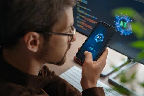 Man talking with AI chatbot app on smartphone 스톡 사진