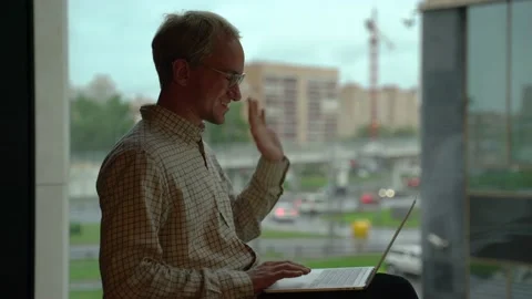 Man talking to camera from home. Video chat or video call screen of man working Stock Footage 132484343