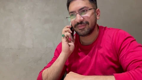Man Talking on Cell Phone and Smiling Stock Footage 235833064