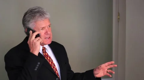MAN TALKING ON CELL PHONE Stock Footage 912504