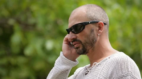 Man Talking On A Cell Phone Video stock 52545525