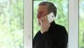 Man talking on a cell phone with a serious look of face HD Footage