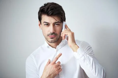 Man talking on the cellphone Stock Photos