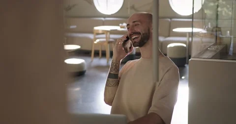 Man talking on mobile and drinking lemonade at cafe Stock Footage 159082095