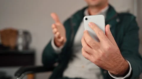Man talking on mobile phone at the office Stock Footage 220050806