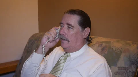 Man talking on old wire telephone - telephone line Stock Footage 54566678