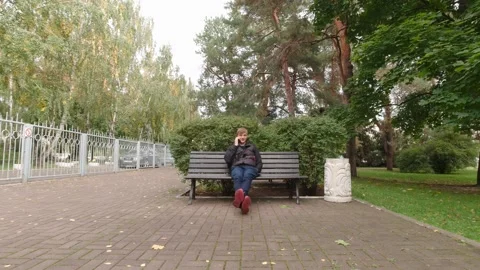 Man Talking On Phone On A Bench Stock Footage 162102252